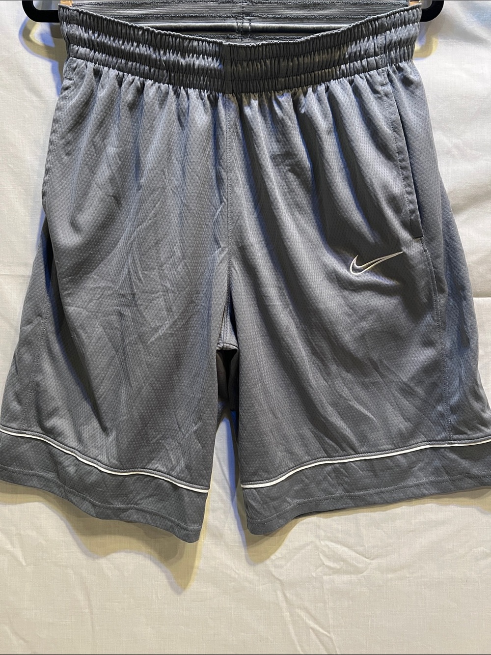 Nike Men's Gray Athletic Mesh Shorts with White Swoosh